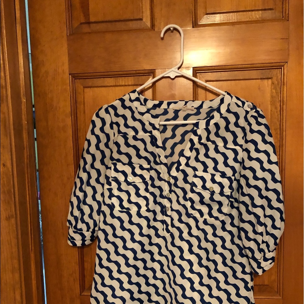 Chevron print white and blue blouse.